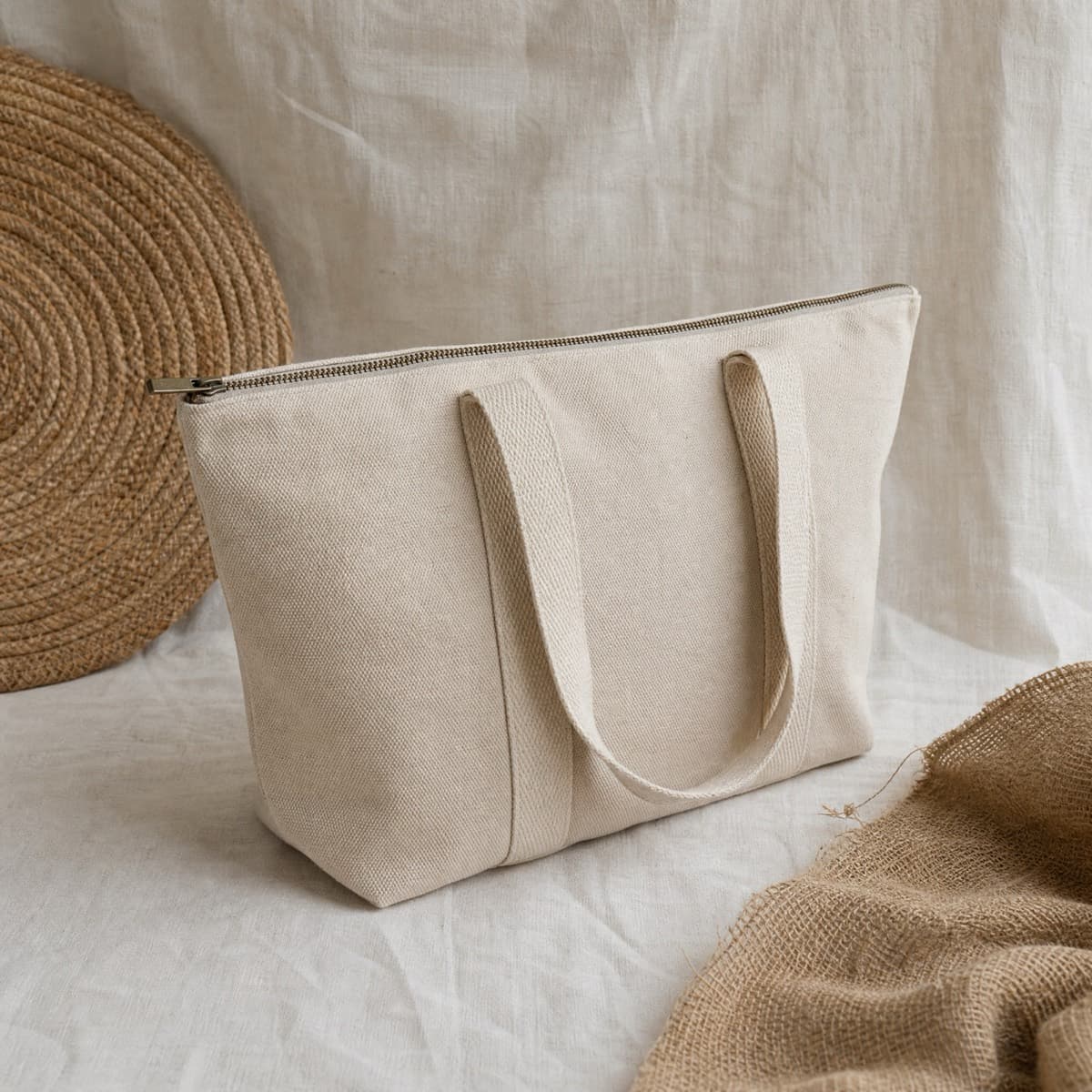 A canvas tote with a full-width top zip